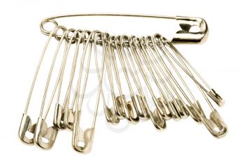 Close-up of safety pins isolated over white