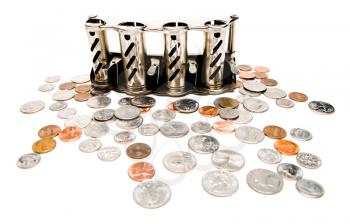 Change dispenser and coins isolated over white