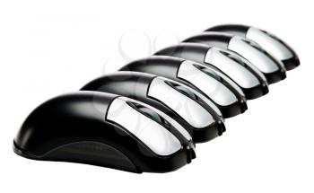 Black color computer mouses in a row isolated over white