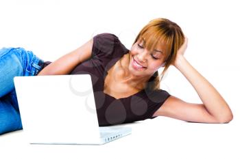 African young woman using a laptop isolated over white
