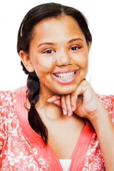 Teenage girl smiling with her hand on chin isolated over white