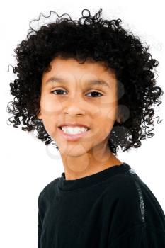 Boy wearing t-shirt and smiling isolated over white