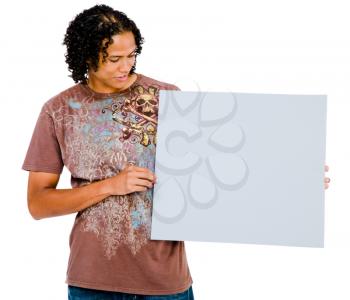 Mixedrace man showing an empty placard isolated over white
