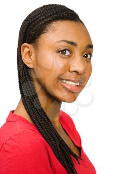 Portrait of a teenage girl posing and smiling isolated over white