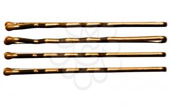Row of brown hairpins isolated over white