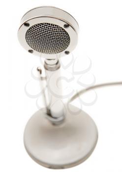 Old microphone isolated over white