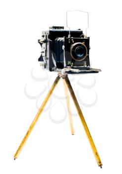 Camera on a tripod isolated over white