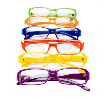 Row of colorful eyeglasses isolated over white