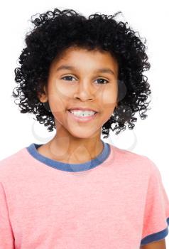 Mixed race boy smiling isolated over white