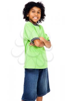 Happy boy standing with her arms crossed isolated over white