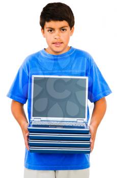 Boy showing a stack of laptops isolated over white