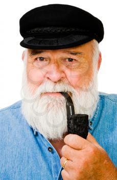 Serious man smoking with pipe isolated over white