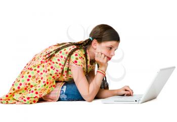 Close-up of a girl using a laptop isolated over white