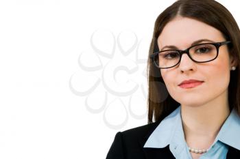 Close-up of a businesswoman wearing eyeglasses isolated over white