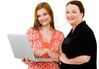 Happy women using a laptop isolated over white