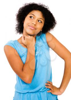 African teenage girl day dreaming and posing isolated over white
