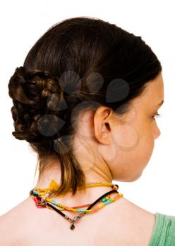 Close-up of a hairstyle of a girl isolated over white
