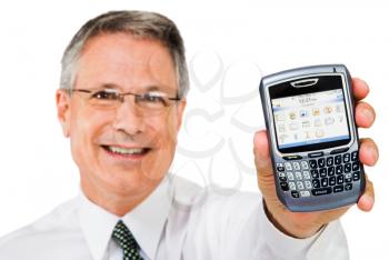 Smiling businessman showing a pda isolated over white