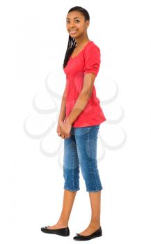 Teenage girl posing and smiling isolated over white