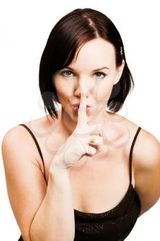 Woman with finger on lips isolated over white