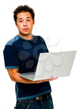 Portrait of a young man using a laptop isolated over white