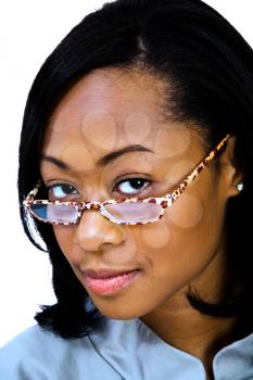 Portrait of a young woman wearing eyeglasses isolated over white