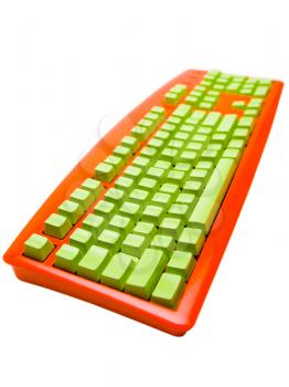 Computer keyboard of orange color isolated over white
