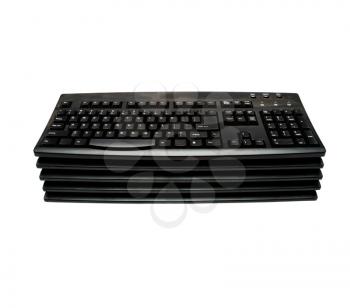 Keyboards in a stack isolated over white