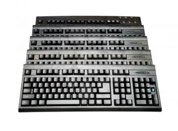 Row of keyboards isolated over white