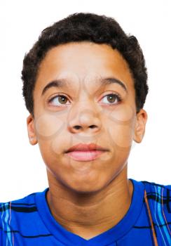 Close-up of a teenage boy isolated over white
