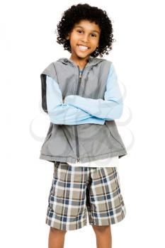 Portrait of a boy standing and smiling isolated over white