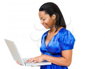 Young woman using a laptop isolated over white