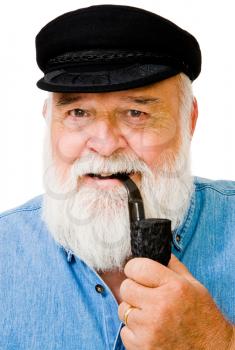 Smiling man smoking with pipe isolated over white