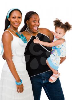 Portrait of a family smiling and posing together isolated over white