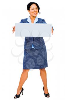 Confident businesswoman showing a placard and posing isolated over white