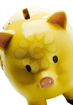 Yellow color piggy bank isolated over white
