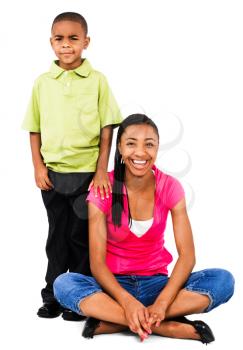 Sister smiling with her brother isolated over white