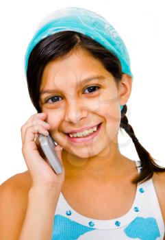 Portrait of a girl talking on a mobile phone isolated over white