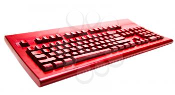 One red color keyboard isolated over white