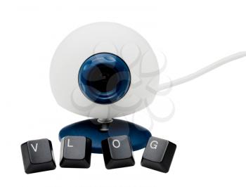 Vlog word of keyboard keys near a webcam isolated over white