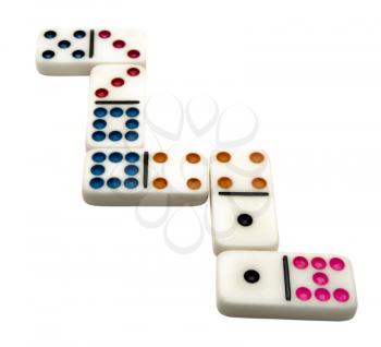 Close-up of dominos isolated over white