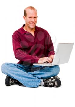 Portrait of a mature man using a laptop isolated over white