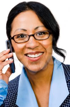 Mixedrace businesswoman talking on a mobile phone isolated over white
