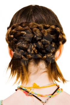 Hairstyle of a girl isolated over white