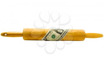 One dollar bill wrapped on a rolling pin isolated over white
