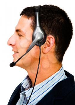 Close-up of a businessman wearing a headset isolated over white