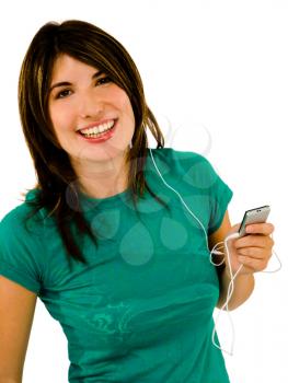 Smiling woman listening to music on a MP3 player isolated over white