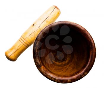 Wooden mortar and a pestle isolated over white