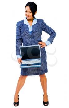 Mixedrace businesswoman holding a laptop and smiling isolated over white