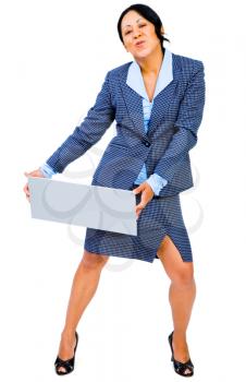 Portrait of a businesswoman showing a placard and dancing isolated over white